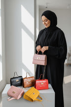 Women's small soft leather handbag