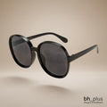 www.bhplus.shop black oversized round frame sunglasses with dark grey lenses.