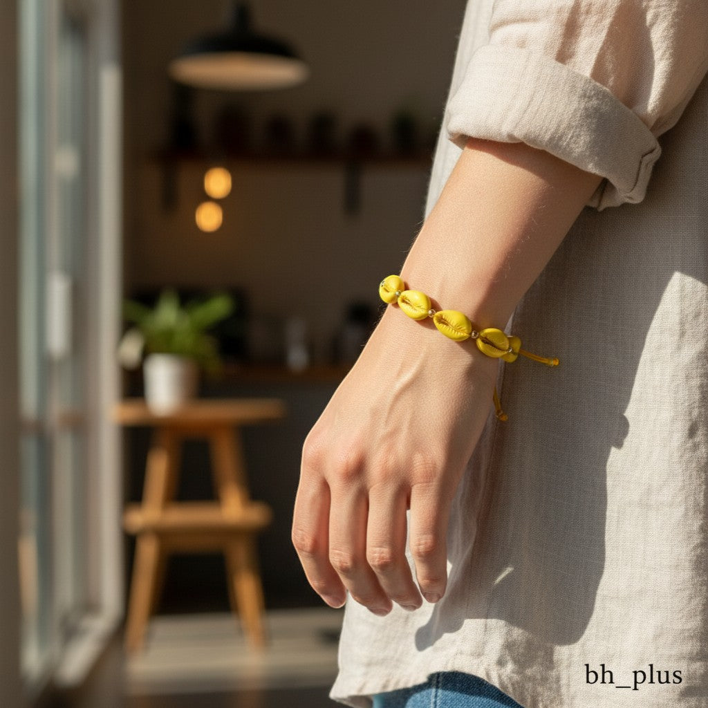www.bhplus.shop yellow cowrie shell and gold bead adjustable bracelet